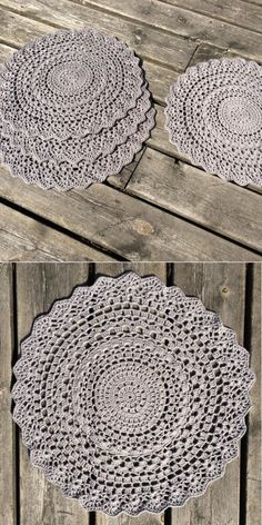 two crocheted doily sitting on top of a wooden table next to each other