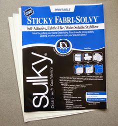 two sheets of sticky fabric sitting on top of each other