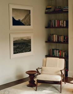 a living room filled with furniture and bookshelves