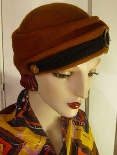 ON SALE/ Original price: $225.00 As fashionably relevant as they were in the early 1930's, percher hats are back in our new Fall/Winter Collection 2016 for Orsini-Medici Couture Millinery!! This chic little chapeaux is one you'll want to grab any day of the week!! Dress it up or down, and go just about anywhere in it!! Entirely hand blocked on a vintage wooden hat block, hand sewn, fully lined, and detailed with an authentic 1930's celluloid dress buckle and matching button.   All the hats in th Retro Cloche Felt Hat For Winter, Retro Winter Cloche Felt Hat, Retro Wide Brim Cloche Hat For Winter, Retro Winter Cloche Hat With Short Brim, Vintage Wool Cloche Hat With Short Brim, Wool Vintage Brimmed Cloche Hat, Vintage Wool Brimmed Cloche Hat, Winter Retro Cloche Hat With Short Brim, Vintage Wool Cloche Hat With Curved Brim