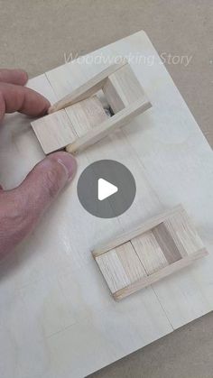 a person is making wooden blocks out of wood