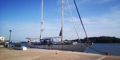 a sailboat is docked at the dock