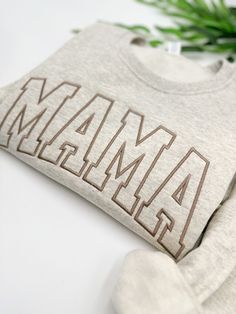 EMBROIDERED Mama Sweatshirt, Birthday gift mama Crewneck, Personalized Sweatshirt, Trendy Crewnecks for Women, Mom gifts, Mother days   The product in the first picture is made with suede brown thread on an oatmeal heather sweatshirt. 💕WELCOME TO Love Stitches Co If you are looking for soft, comfy, first-rate sweatshirts, you're in the right place! Here at Love Stitches Co, we love what we do and strive to make your shopping experience just right for you. If you have any questions, concerns, or Mother's Day Gift Tops With Embroidered Text, Mother's Day Gift Tops With Letter Embroidery, Mother's Day Embroidered Text Tops, Crewnecks For Women, Mama Embroidered Sweatshirt, Mom Christmas Shirt, Mother Days, Mother Days Gift, Mama Crewneck