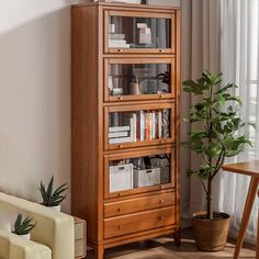 a tall wooden bookcase in a living room