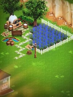 an image of a farm yard with blue flowers