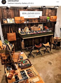 a table with lots of leather goods on it