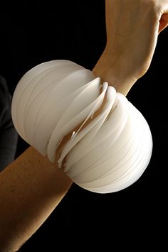 Sculptural bracelet with half moon segments, made with polypropylene plastic; art jewellery // Caroline Moiret Wearable Sculpture, White Jewellery, Contemporary Bracelets, Moon Bracelet, Plastic Art, Natural Amber