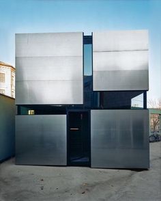 the building is made out of metal doors