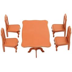 an orange table and chairs set up on a white background