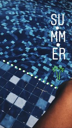 a woman's legs next to a swimming pool with the words su mm er on it