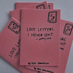 four pink envelopes with love letters on them are stacked up in a pile and one has the word love letters i never sent