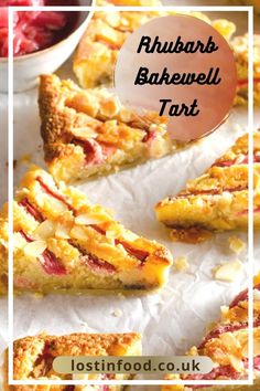 a close up of food on a table with text overlay that reads rhubarb bakewell tart