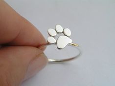 Jan 1, 2020 - Paw Print Ring Sterling Silver Cat or Dog by DaliaShamirJewelry Gold Bar Earrings Studs, Paw Print Ring, Paw Ring, Paw Print Jewelry, Sterling Silver Cat, Bar Stud Earrings, Silver Cat, Printed Jewelry, Engagement Rings Opal