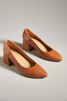 Leather upper Memory foam insole Leather, rubber sole Slip-on styling Imported | Fiorela Go-To Mid Heels by Nisolo in Brown, Women's, Size: 7.5, Leather/Rubber at Anthropologie Huma Blanco Shoes, Leather Slip-on Heels With Sculpted Heel, Modern Leather Slip-on Court Shoes, Medium Width Leather Heels With Block Heel, Modern Leather Heels With Padded Heel, Brown Leather Block Heels With Padded Heel, Brown Leather Closed Toe Block Heels, Leather Block Heels With Padded Low Heel, Leather Court Shoes With Reinforced Heel And Pointed Toe