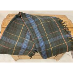 Super Soft Merino Lambswool Knee Rug/Blanket In A Classic Green And Blue Tartan Plaid Pattern- Made In England.  Our knee blankets are cut to a smaller size then a traditional throw which is perfect for laying across your knees, dressing furniture, wrapping around your shoulders and bringing along as a travel blanket.  Established in 1837 with over 180 years of proud British manufacturing & design heritage already to our name, They are one of Great Britain’s last remaining vertical woolen mills. Furniture Wrapping, Plaid Bedroom, Tartan Throws, Plaid Throw Blanket, Navy Blanket, Travel Blanket, Plaid Throw, Blue Tartan, Plaid Blanket