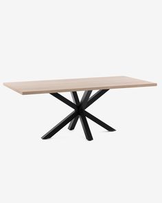 a wooden table with black metal legs