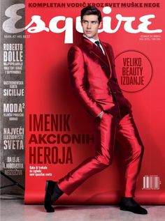 a man in a red suit on the cover of esqure