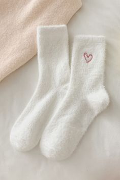 These White Heart Embroidered Soft Thick Crew Socks offer a comfortable and stylish option for your daily wear. Crafted with soft and thick material, they provide warmth and cushioning for your feet. The white heart embroidery adds a charming touch, making these socks a perfect addition to your wardrobe. Outdoor Socks, Velvet Socks, Luxury Socks, Fleece Socks, Women Crew Socks, Sock Game, Embroidered Heart, Warm Socks, Top Pants Set