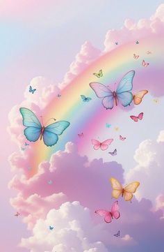 there are many butterflies flying in the sky above the clouds with a rainbow behind them