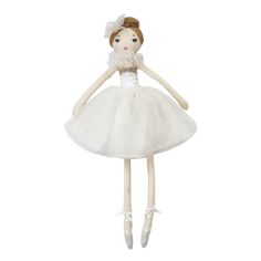 a white doll with a dress and shoes on it's feet, standing in front of a white background