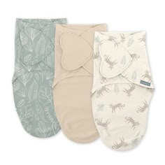 three baby swaddles in various colors and patterns, one with an insect print on it