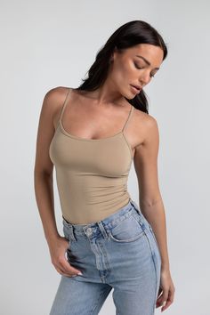 Details Kim is your everyday scoop neck tank top that features a hold-you-in fabric and full length style that sits below the natural waistline. Made in LA Pre-washed Everyday Camisole Tank Top With Built-in Bra, Everyday Tank Top With Built-in Bra And Scoop Neck, Seamless Scoop Back Camisole For Summer, Basic Tank Top With Built-in Bra For Everyday, Summer Camisole With Built-in Bra And Scoop Back, Summer Seamless Camisole With Scoop Back, Everyday Seamless Camisole Tank Top, Summer Seamless Scoop Back Camisole, Summer Scoop Back Seamless Camisole