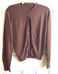 This authentic 1970's vintage brown cardigan sweater is in good condition with a little pilling. It is long sleeved with buttons up the front. Bust-36 inches Length-23 inches Sleeve-25 inches To see more of our vintage 1970's clothing inventory please visit our store at ChoiceRecycling.  We add new items every week. Thank you, Karmyn Womens Hooded Sweater, Hooded Sweater Coat, Brown Cardigan Sweater, 1970s Clothing, Penny Lane Coat, Brown Cardigan, Floral Shirt Dress, Brown Jacket, Hooded Coat