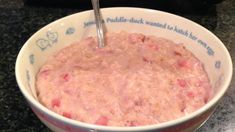 a bowl filled with oatmeal sitting on top of a counter