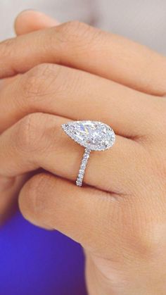 Halo Teardrop engagement ring Drop Engagement Ring, Expensive Wedding Rings, Pear Shaped Diamond Engagement Rings, Engagement Ring Halo, Pear Ring, Ring Halo, Engagement Rings Marquise, Wedding Rings Halo, Wedding Rings Solitaire