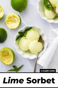 lime sorbet in small white bowls with spoons and mint on the side