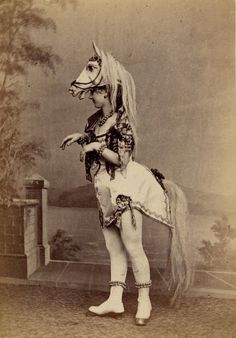 an old fashion photo of a woman in costume on a horse, with the caption'the devil's auction '