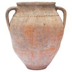 an old clay vase is shown on a white background for use as a decoration element