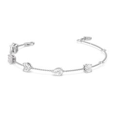 Can't decide which diamond cut to pick? Wear them all through this diamond bracelet. The bracelet chain bears five diamonds - a princess, emerald, heart, pear, and round cut - on prong basket settings. The sparkly yet unassuming look of this bracelet allows it to work as an everyday or special occasion accessory. Luxury White Gold Heart Cut Bracelets, Luxury Elegant Heart Bracelet With Brilliant Cut, Heart Diamond Bracelet, Round Cut, Diamond Heart, Diamond Bracelet, Emerald, Diamond Cuts, White Gold