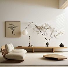 a living room with white walls and furniture