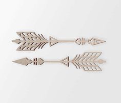 two wooden arrows on a white background