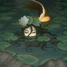 a woman floating on top of a body of water next to a lily covered shore