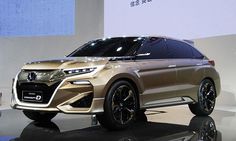 the new honda concept suv is on display at an auto show in shanghai, china