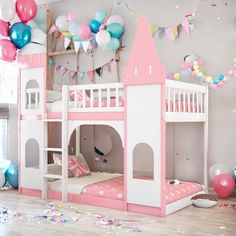 a pink and white bunk bed in a room with balloons