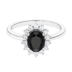 Product Details Youll adore the timeless design of this Princess Diana inspired ring, featuring an oval-shaped Black Onyx as the main stone and a halo of round Diamond. This Black Onyx Ring emanates a luxurious look. Product Information SKU SHP-RINGS0821231760 Width 4 mm Height 11 mm Weight 2.56 gm (Approximate) BLACK ONYX INFORMATION No.of Stones 1 Pieces Total Weight 1.10 Carat (Approximate) Dimension(approx) Oval-6X8 mm-1 Pcs Color Black Cut Brilliant Shape Oval Setting Type Prong-Setting Qua Classic Black Halo Jewelry, Classic Black Ring With Halo Setting, Elegant Black Oval Ring, Formal Black Sapphire Ring With Center Stone, Elegant Black Sapphire Ring With Center Stone, Classic Black Sapphire Oval Ring, Black Oval Diamond Ring For Anniversary, Classic Black Oval Sapphire Ring, Black Oval Anniversary Ring