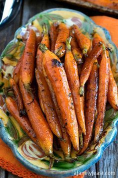 roasted carrots with herbs on a plate