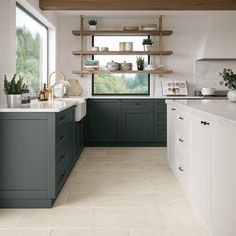 a large kitchen with green cabinets and white counter tops, along with open shelving on the wall