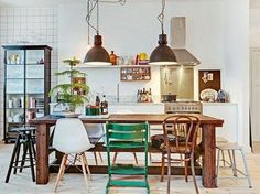 the kitchen is clean and ready to be used as a dining room or living room