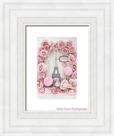 the eiffel tower is surrounded by pink roses and hearts in front of it