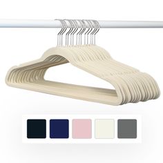 a white plastic hanger with five colors