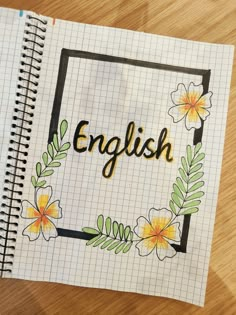 an open notebook with the word english painted on it