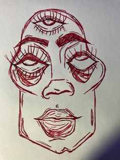 a drawing of a woman's face with her eyes closed and eyebrows drawn on paper