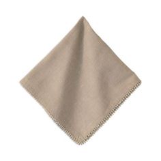 the linen napkin is folded on top of it's own edge, and has fringes at the edges