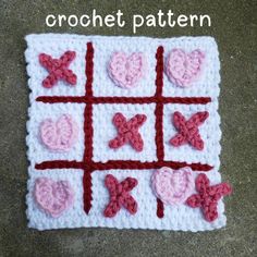 a crochet pattern with hearts and crosses on it