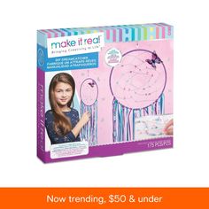 the make it real dream catcher kit is pink and blue with butterfly decorations on it