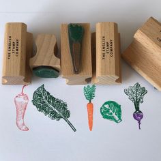 several rubber stamps with vegetables on them